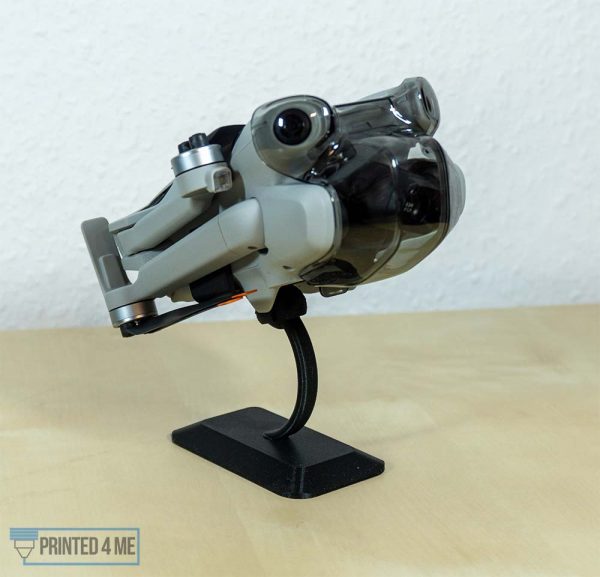 Printed4Me DJI Mini 4 Pro Halterung Ständer Aufsteller - Ständer mit Drohne zusammengefaltet